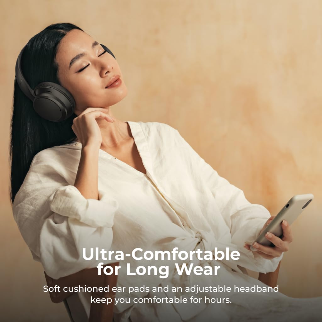 Woman wearing headphones and holding a phone with text about ultra-comfortable headphones.